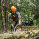 STihl MSA300 battery chainsaw cutting log
